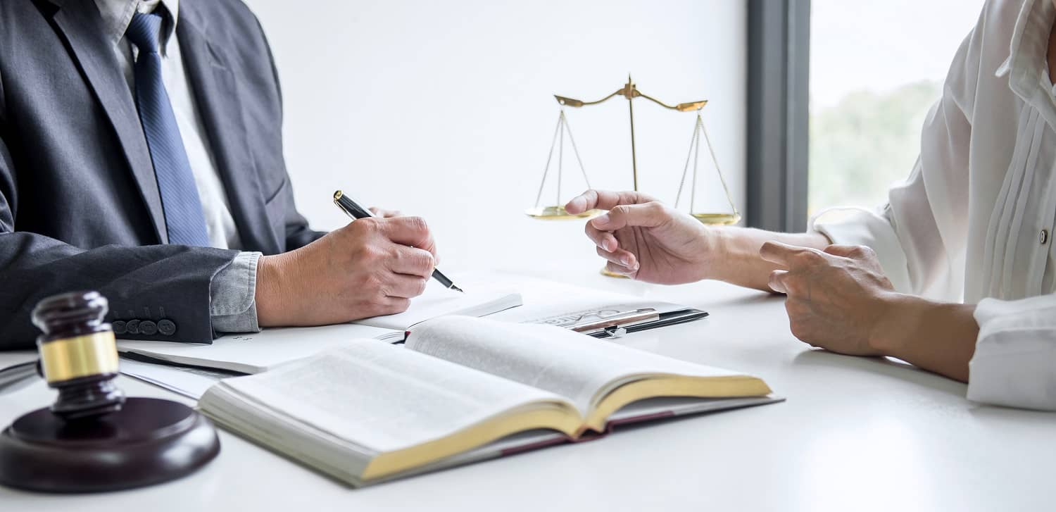 people talking in a lawyer's office