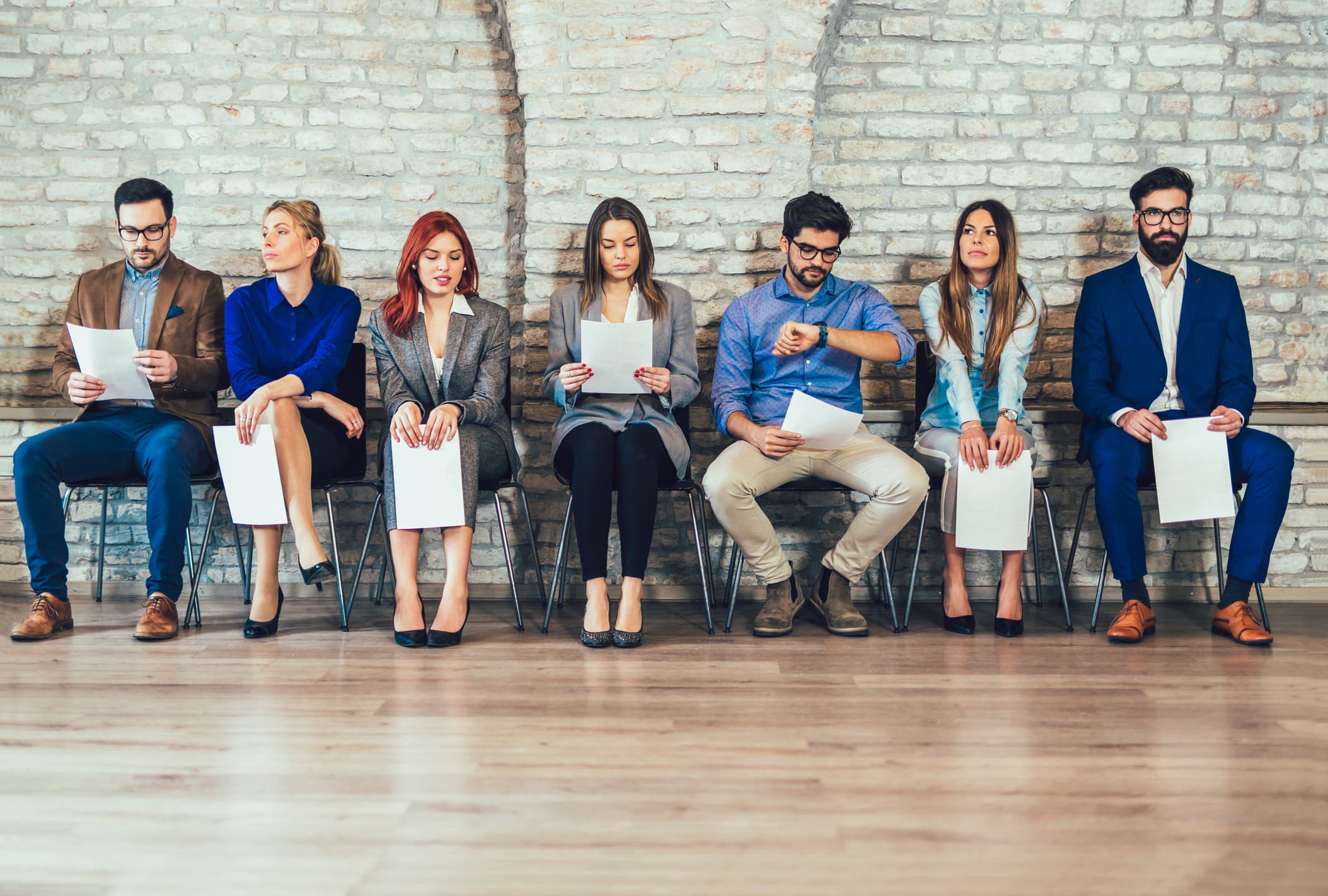 job candidates sititng in chairs