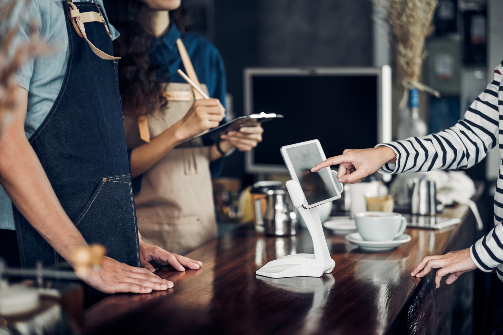 person ordering at a coffee shop