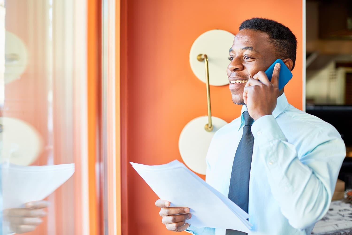 businessman talking on a phone in an office setting
