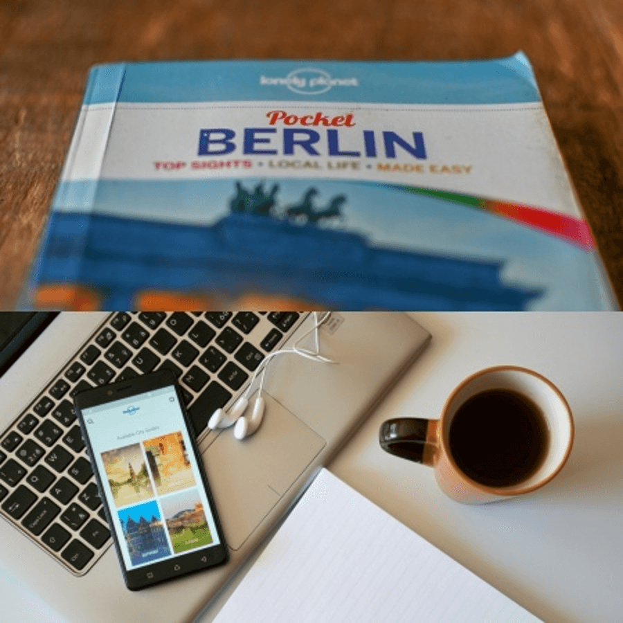 Travel guide above a smartphone