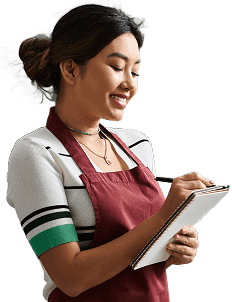 Smiling person holding clipboard