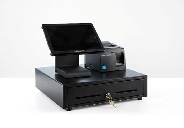 Lightspeed retail POS hardware setup with a tablet stand, receipt printer and cash drawer.