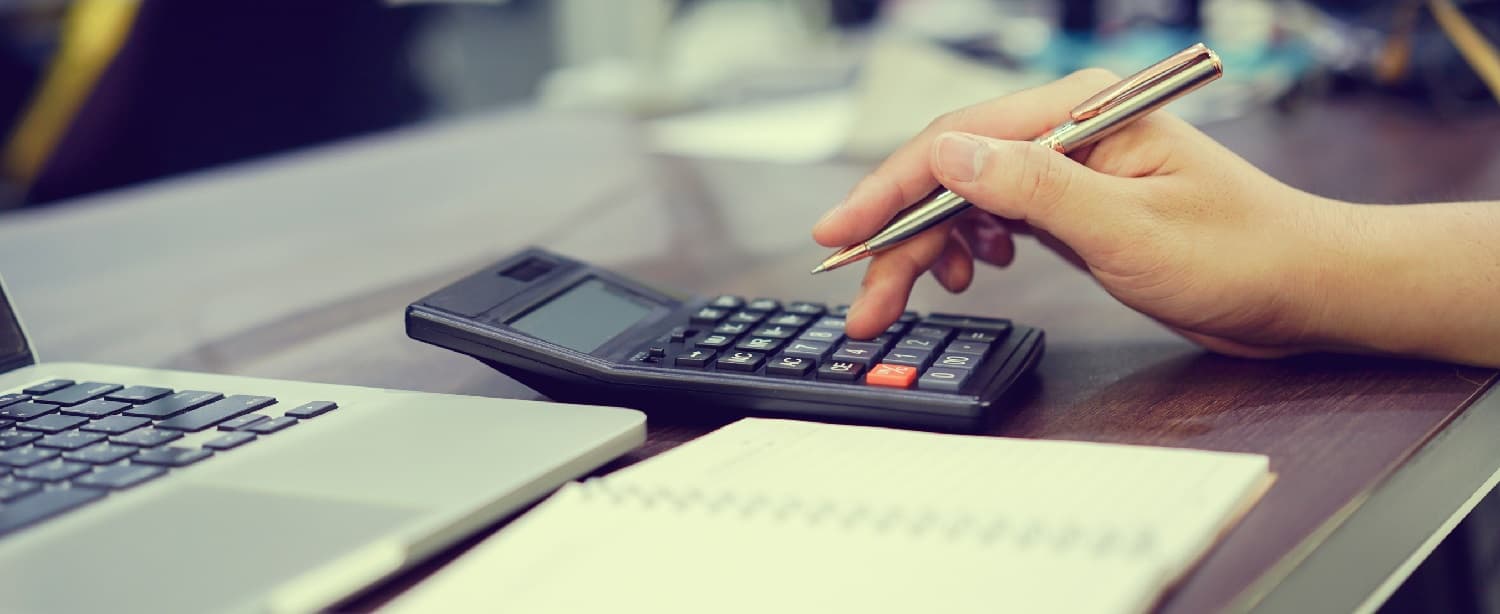 accountant using a calculator