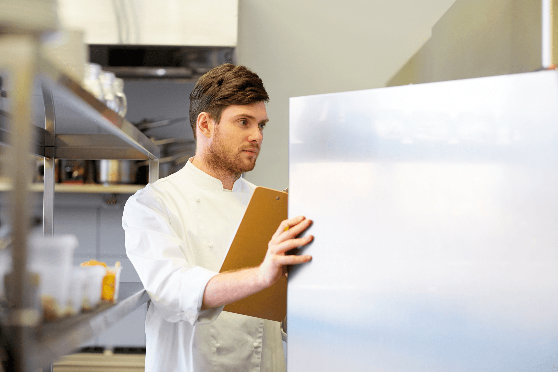 chef checking a restaurant freezer