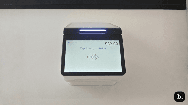 GoDaddy Smart Terminal Duo displaying a customer payment screen.