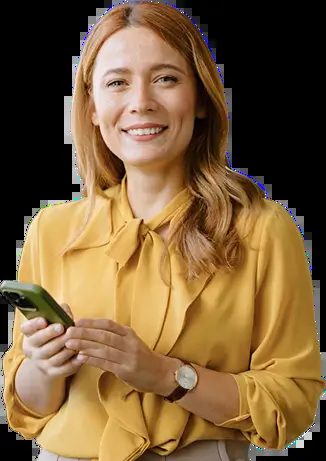 A smiling woman holding a phone